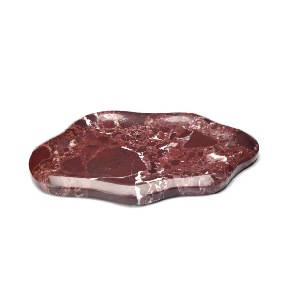 Side profile of the Cloud Irregular Burgundy Marble Tray, showing the beautifully curved edges and rich red and white marble texture.