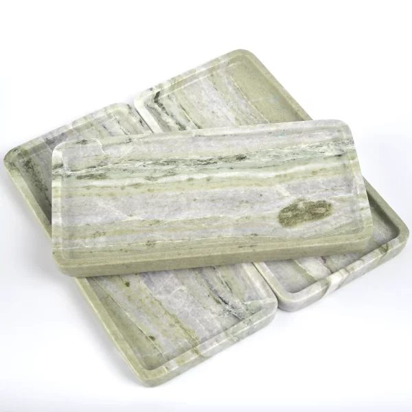 Three Rectangular Green Forest Marble Trays stacked on top of each other on a white background, showcasing the elegant veining and polished surface.