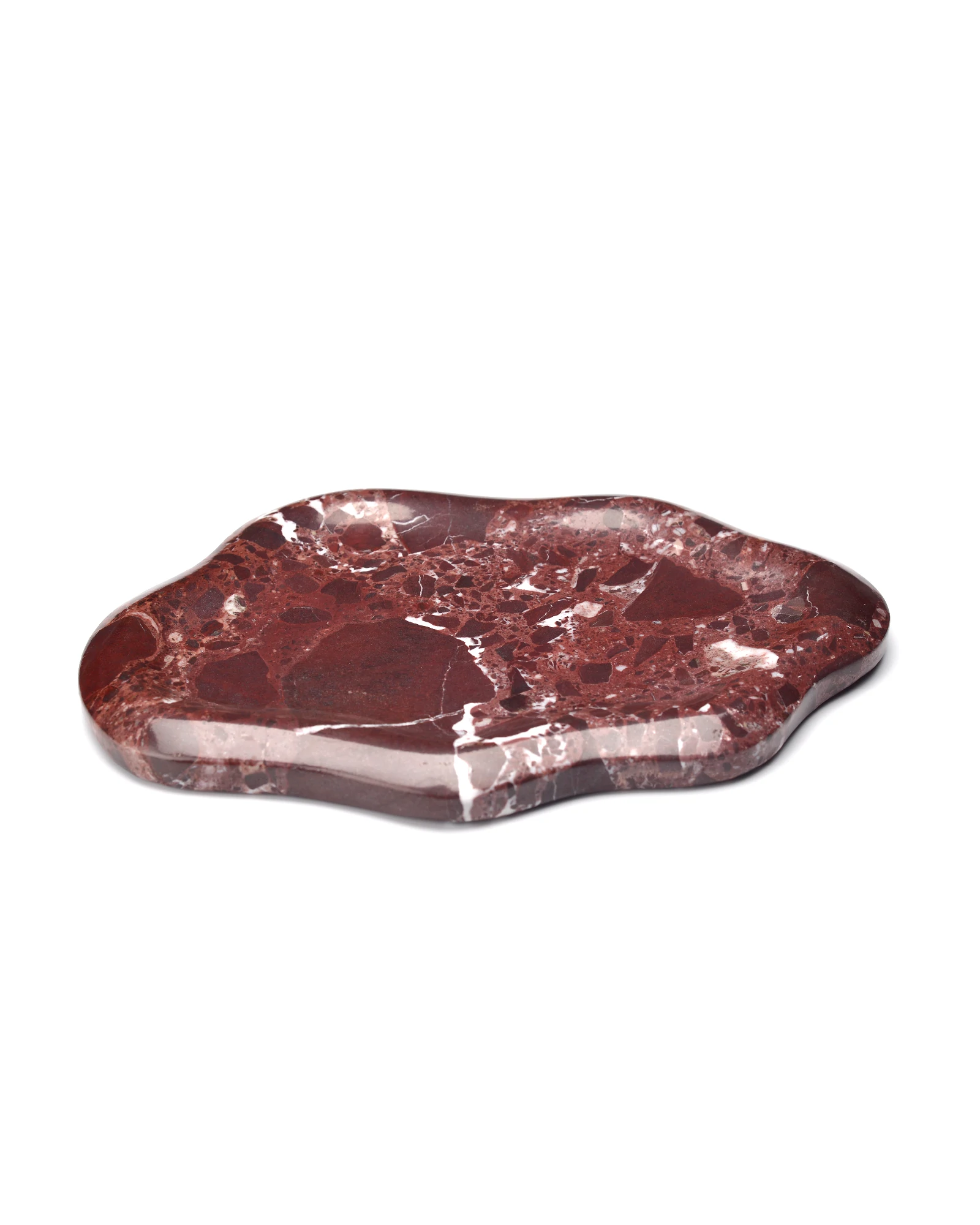 Side profile of the Cloud Irregular Burgundy Marble Tray, showing the beautifully curved edges and rich red and white marble texture.