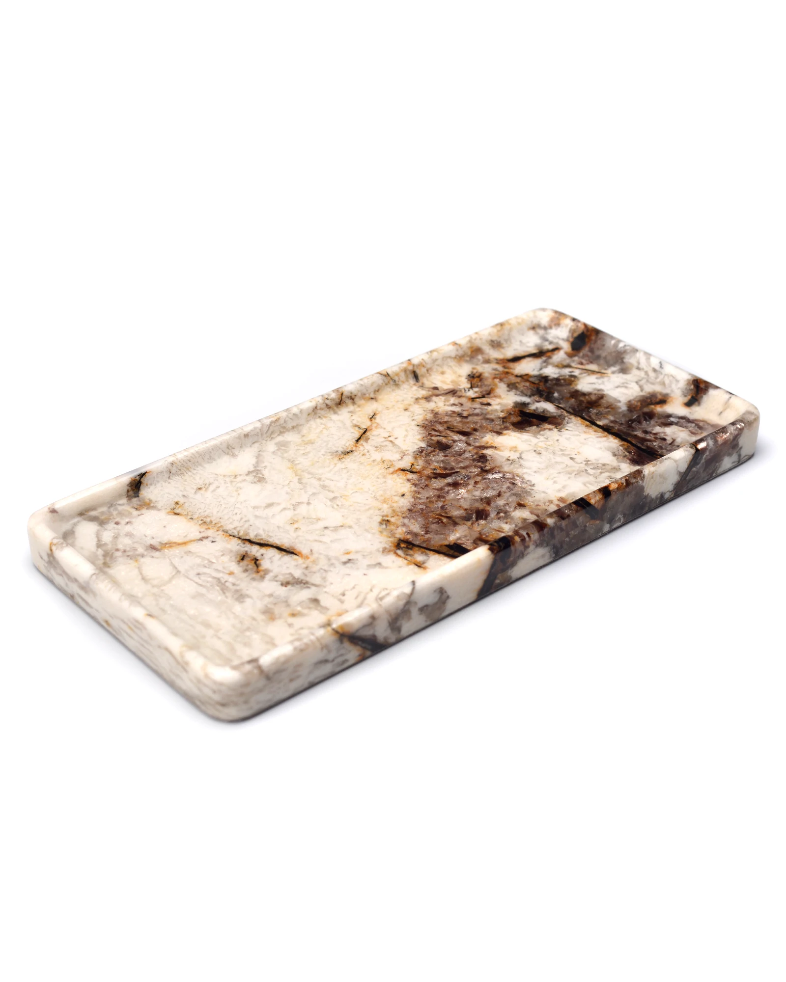 Close-up of marble tray showing brown, orange, and cream stone veining