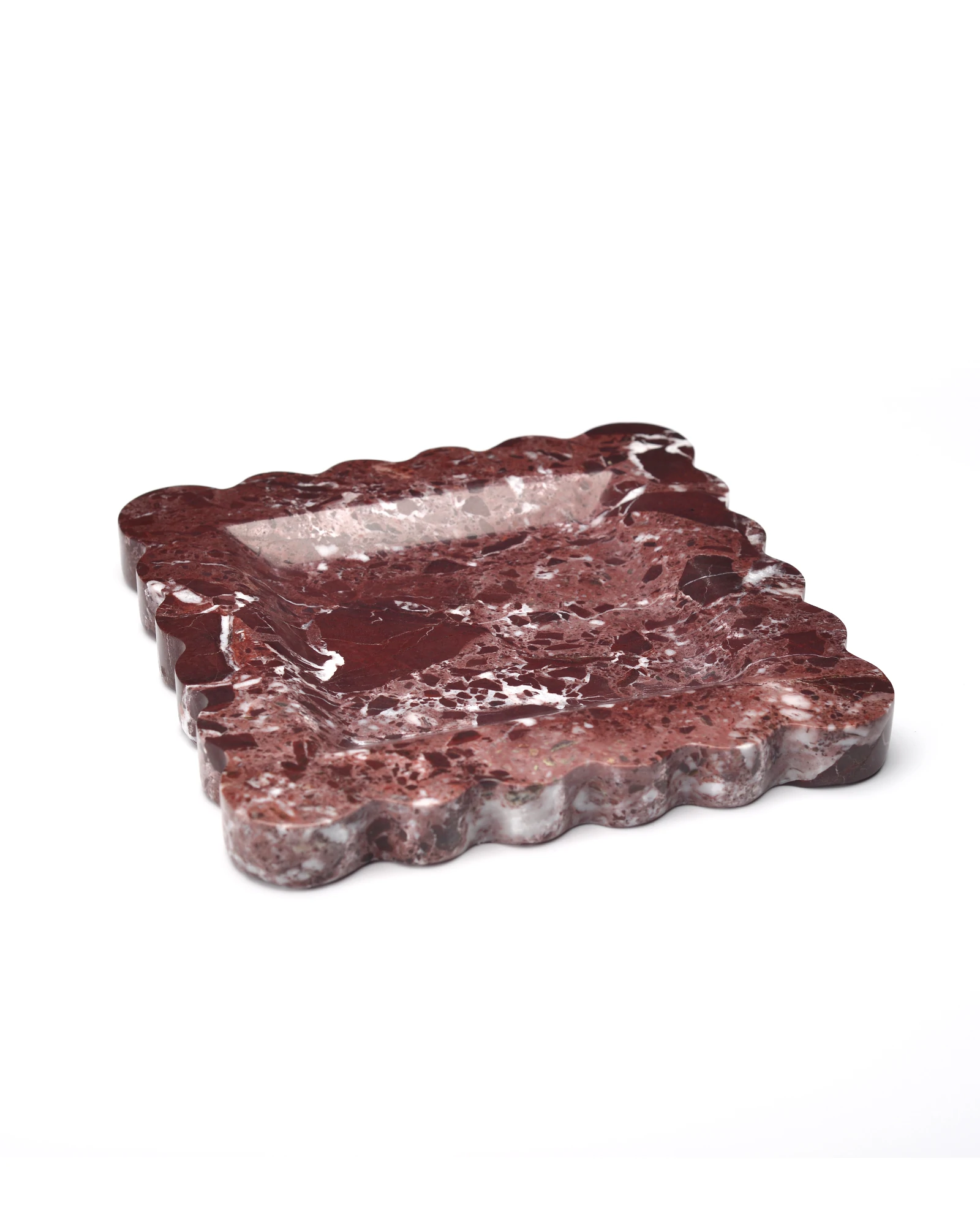 Side profile of the scalloped edge square burgundy marble tray, highlighting its beautifully curved fan-shaped edges and smooth, glossy finish.
