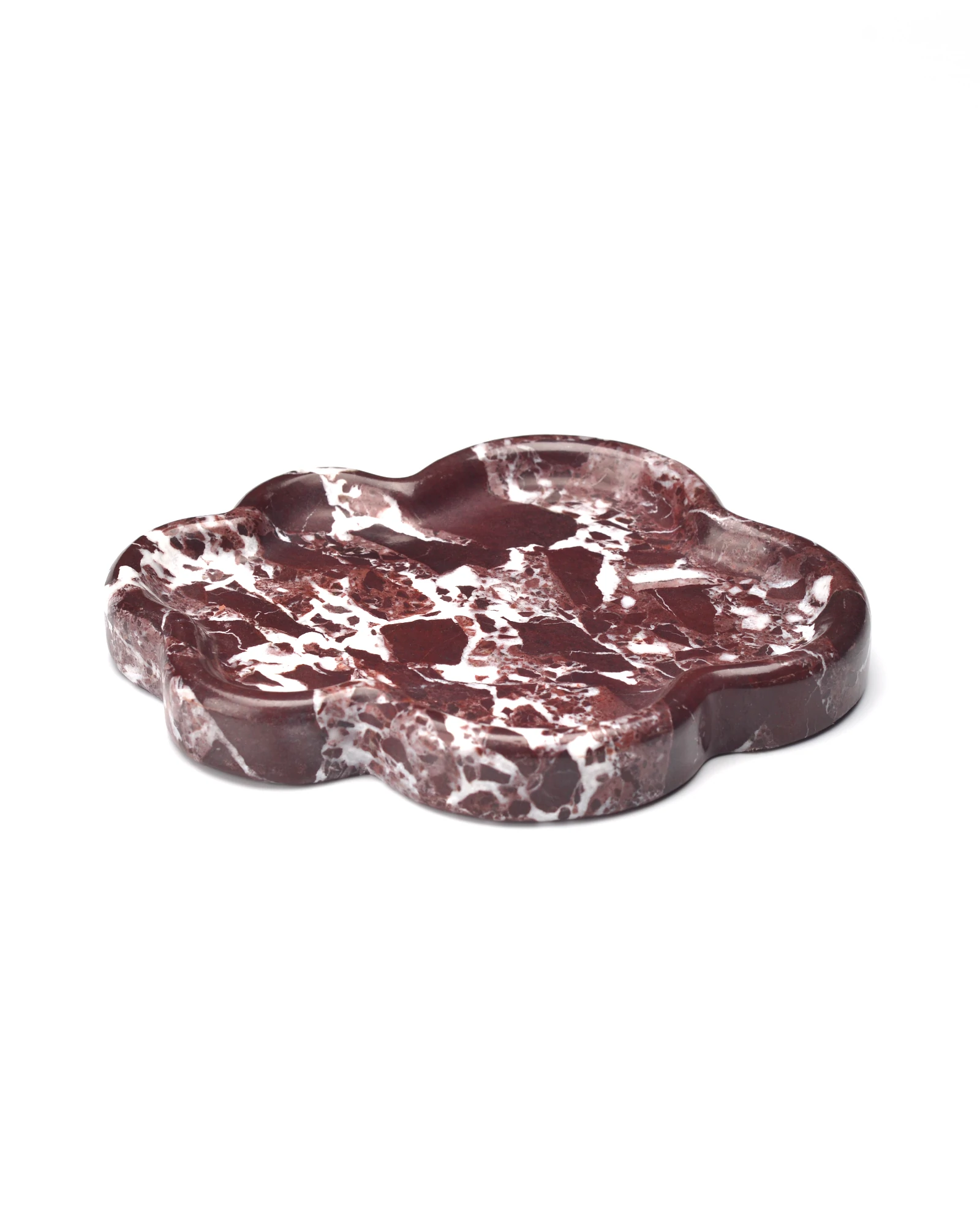 Close-up view of The Cloud Irregular Burgundy Marble Tray, showcasing its scalloped edges and polished stone surface