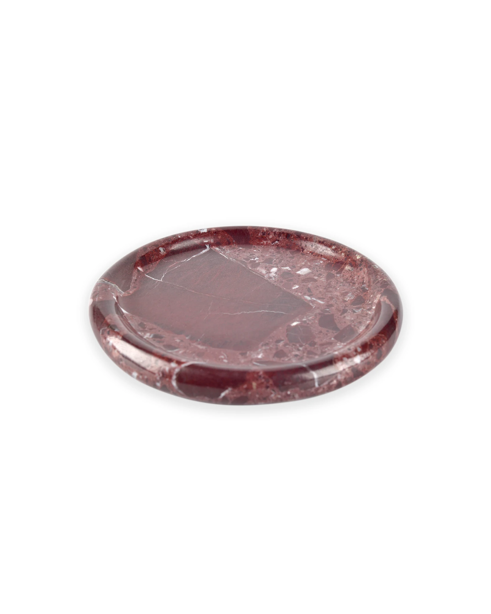 Round burgundy marble tray featuring natural red marble color blocks and white veining, with a smooth polished surface