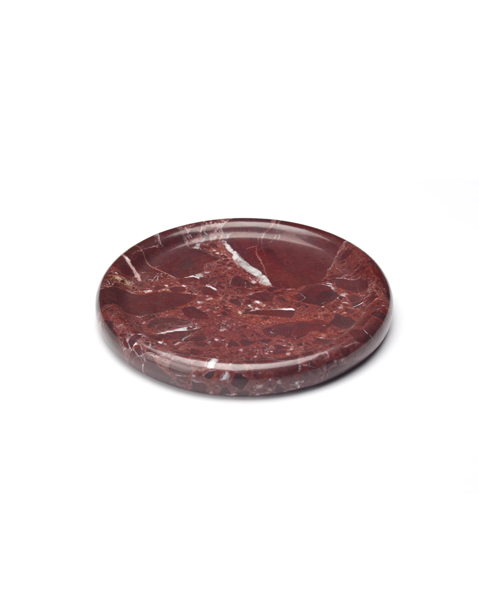 Round burgundy marble tray with natural red color blocks and white veining, polished smooth surface