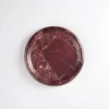 Detailed top view of Round Burgundy Marble Tray with polished surface and natural red veining