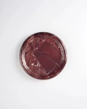Detailed top view of Round Burgundy Marble Tray with polished surface and natural red veining