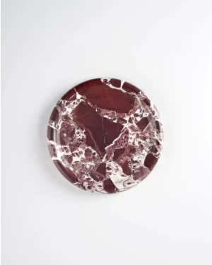 Top view of polished Round Burgundy Marble Tray with natural red and white marble patterns