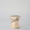Calacatta Marble candle holder shaped like a small torch, with translucent marble and intricate veining