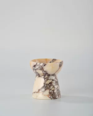 Compact Calacatta Marble candle holder shaped like a small torch, a beautiful and functional home decor piece