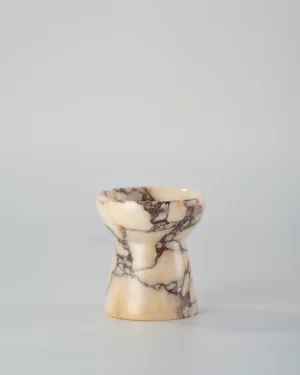 Small torch-shaped Calacatta Marble candle holder, a finely crafted and stylish home decor piece