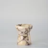 Handcrafted Calacatta Marble candle holder shaped like a small torch, an elegant and compact home decor item
