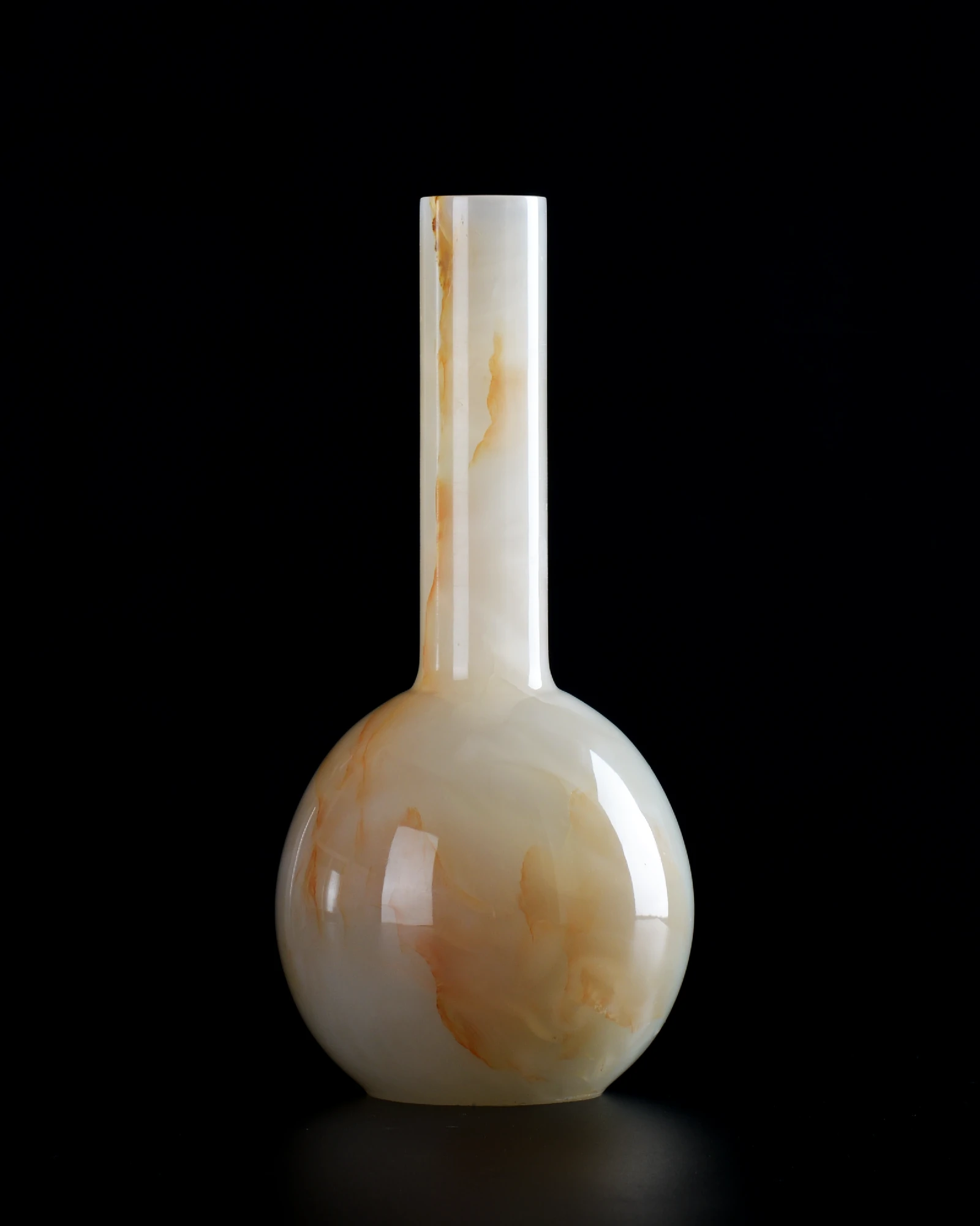 White Onyx Vase with translucent white stone and flame-like orange-red veining, uniquely elegant.