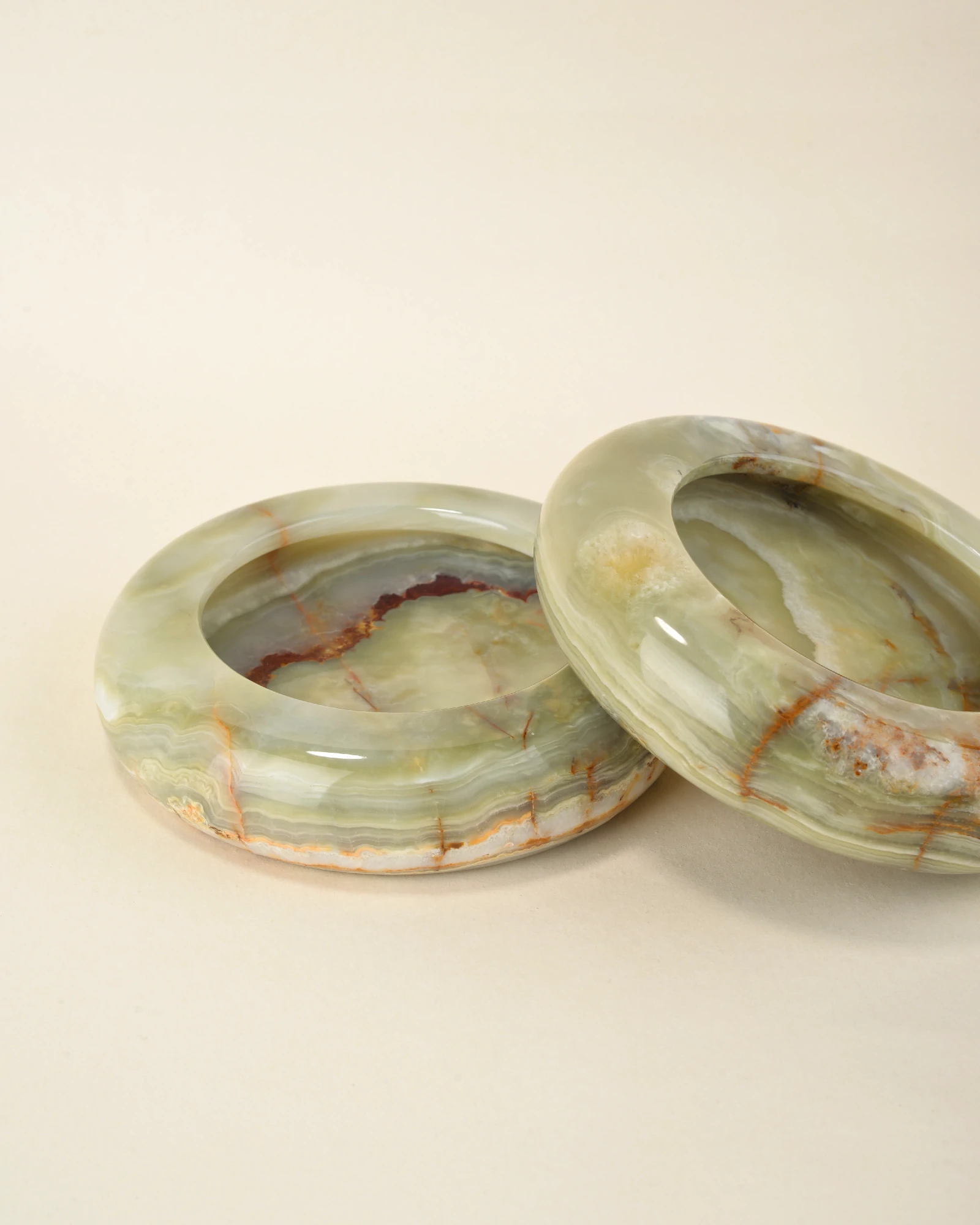 Multiple Round Green Onyx Ashtrays with unique natural patterns for cigar and cigarette smokers