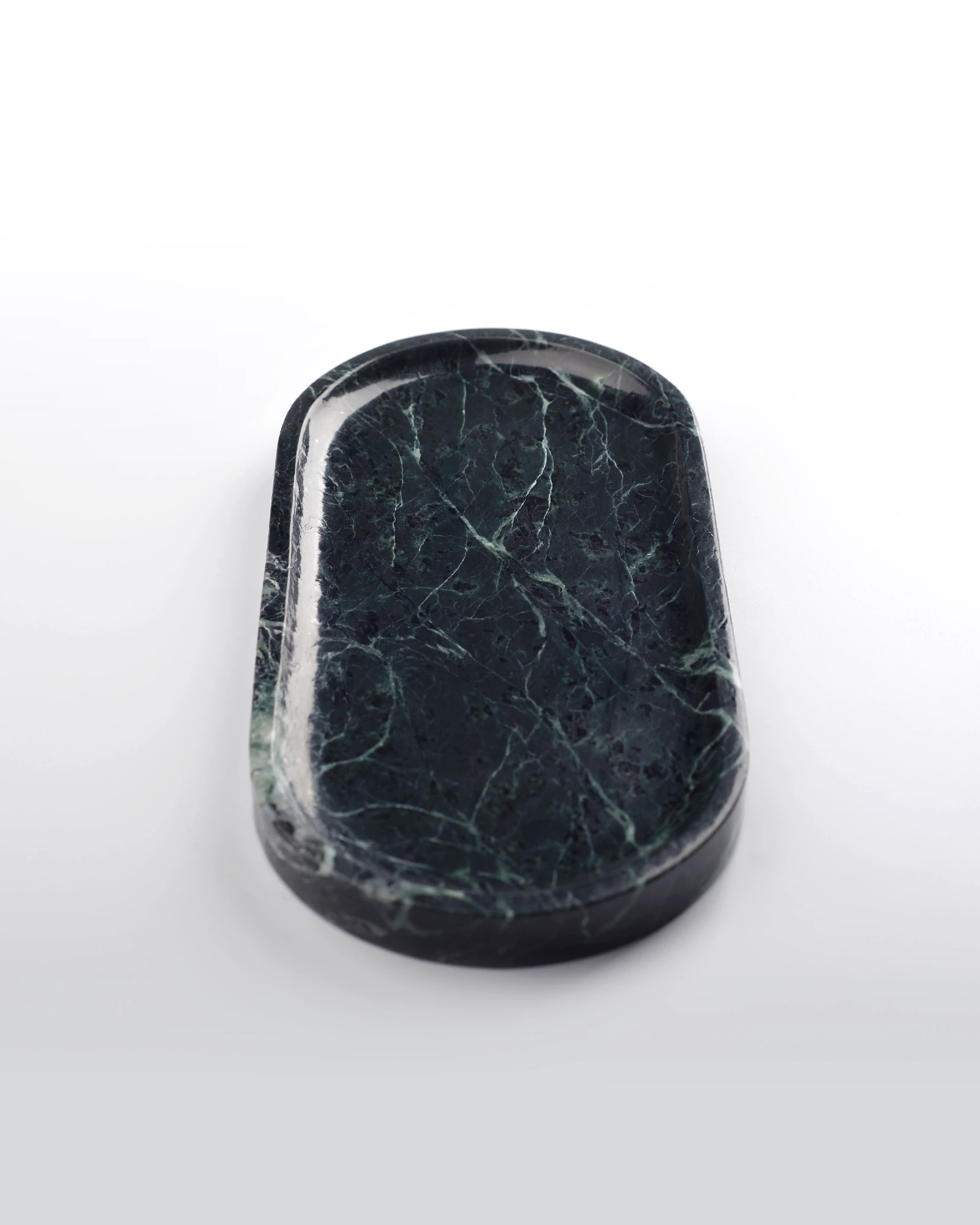 Handcrafted Oval Dark Green Marble Tray with natural white veins and semi-translucent crystal highlights