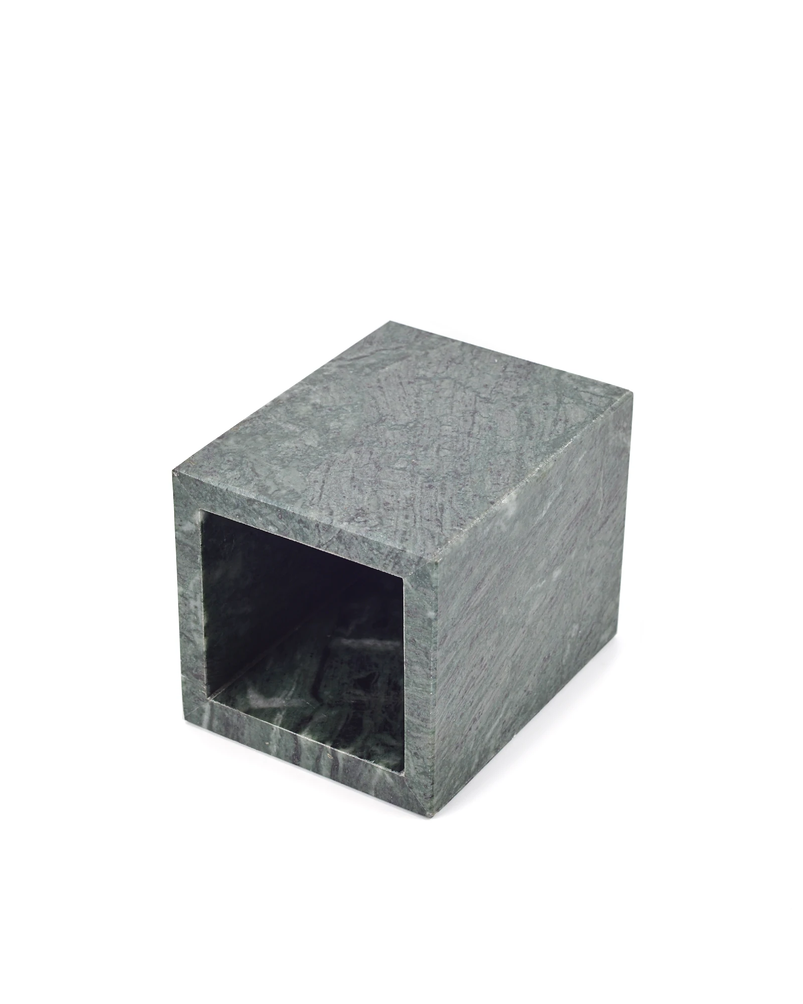 Side view of green marble candle holder showing cup depth and fine craftsmanship