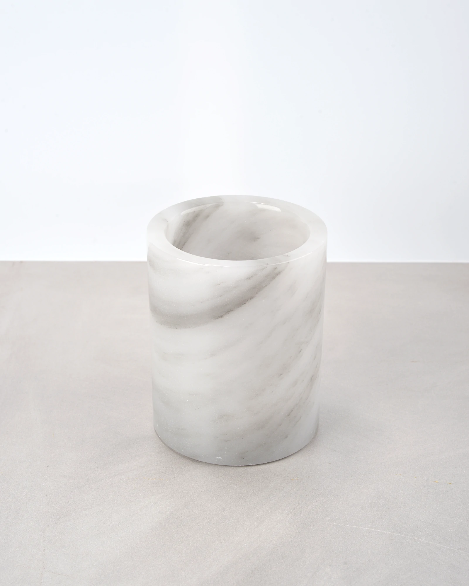 Smoothly polished rim of the grey onyx pen holder