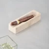 Travertine cigar ashtray displayed as decorative home accessory on tabletop