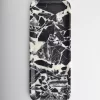 Black marble tray with fine, intricate white veining
