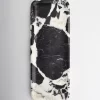 Black marble tray with high contrast veining resembling ink painting