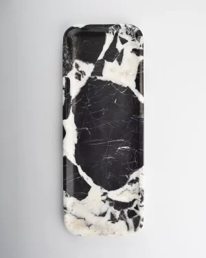 Black marble tray with high contrast veining resembling ink painting
