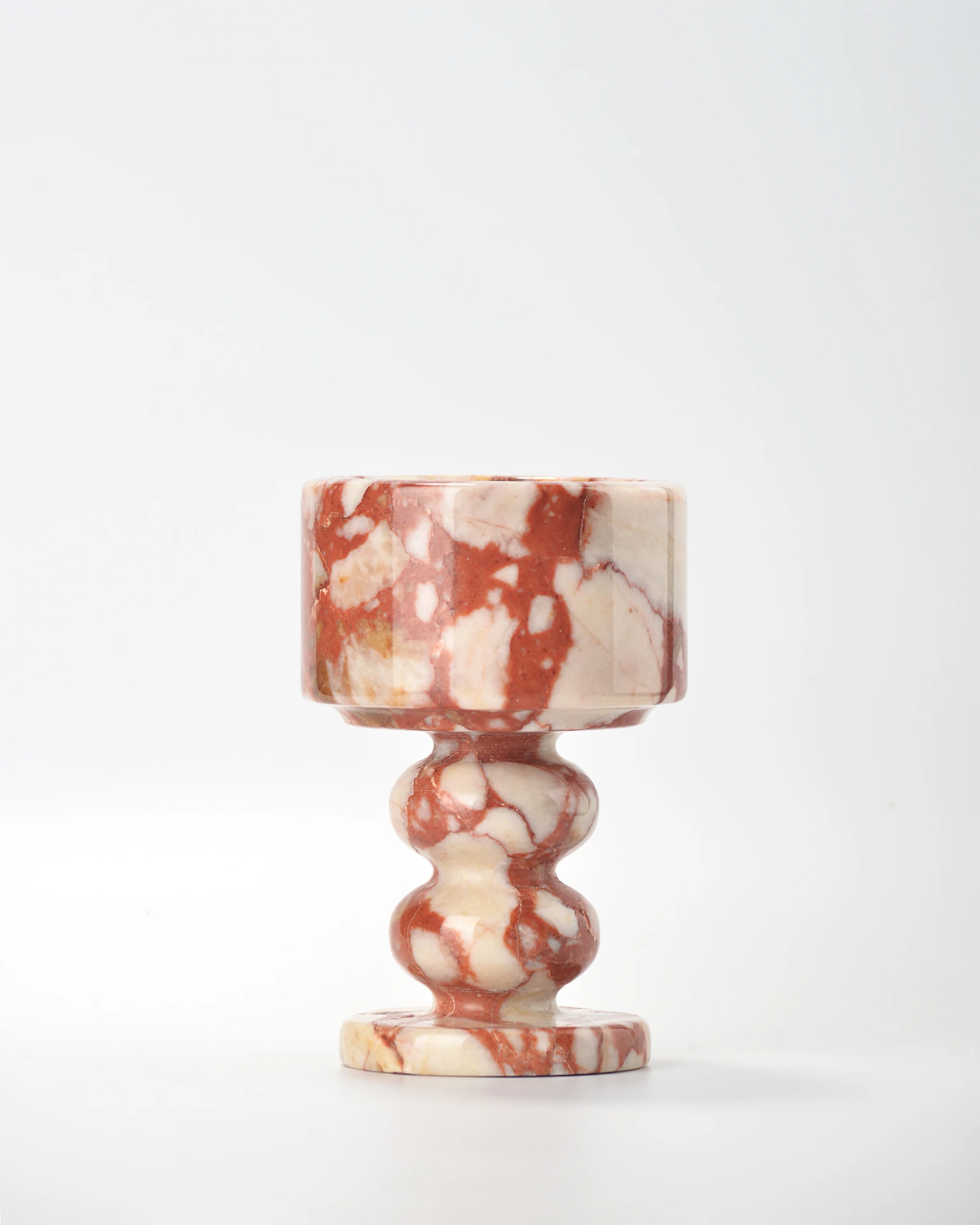 Bvlgari Red Marble Candle Holder with bold red veining on ivory base