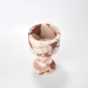 Angled view of marble candle holder showing goblet depth and profile