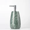 Front view of large green marble soap dispenser with deep, uniform tone