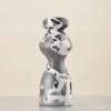 Front of marble vase with grey-dominant tone and scattered black and white inclusions