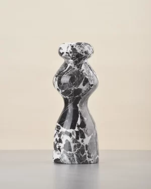 Back of marble vase showing dominant black stone block