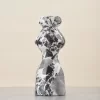 Marble vase front with evenly distributed black and white veining
