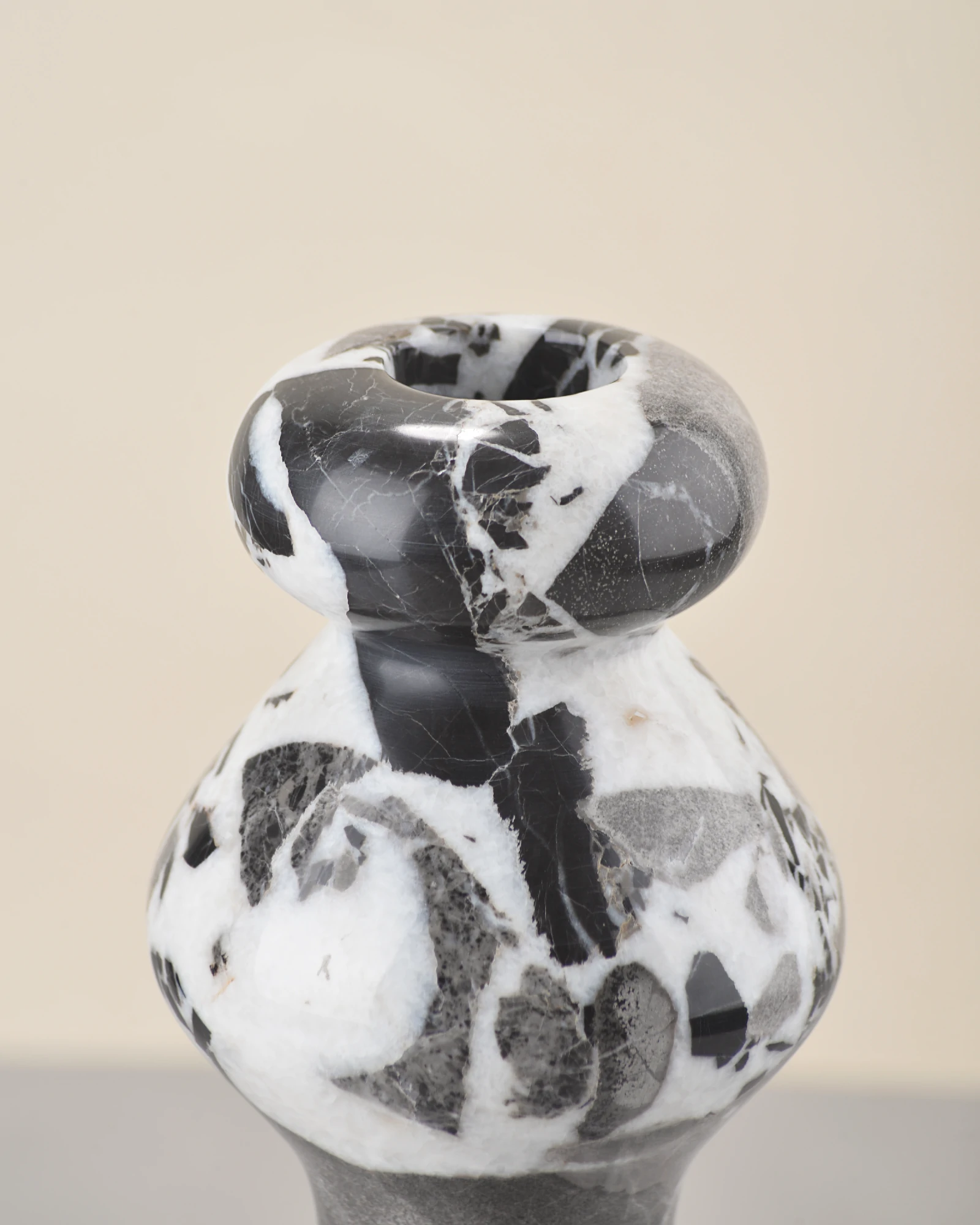 Close-up of marble vase rim, smoothly polished by hand