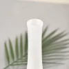 Polished rim detail of white onyx marble decorative vase