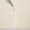 Modern white onyx marble vase with smooth, streamlined silhouette