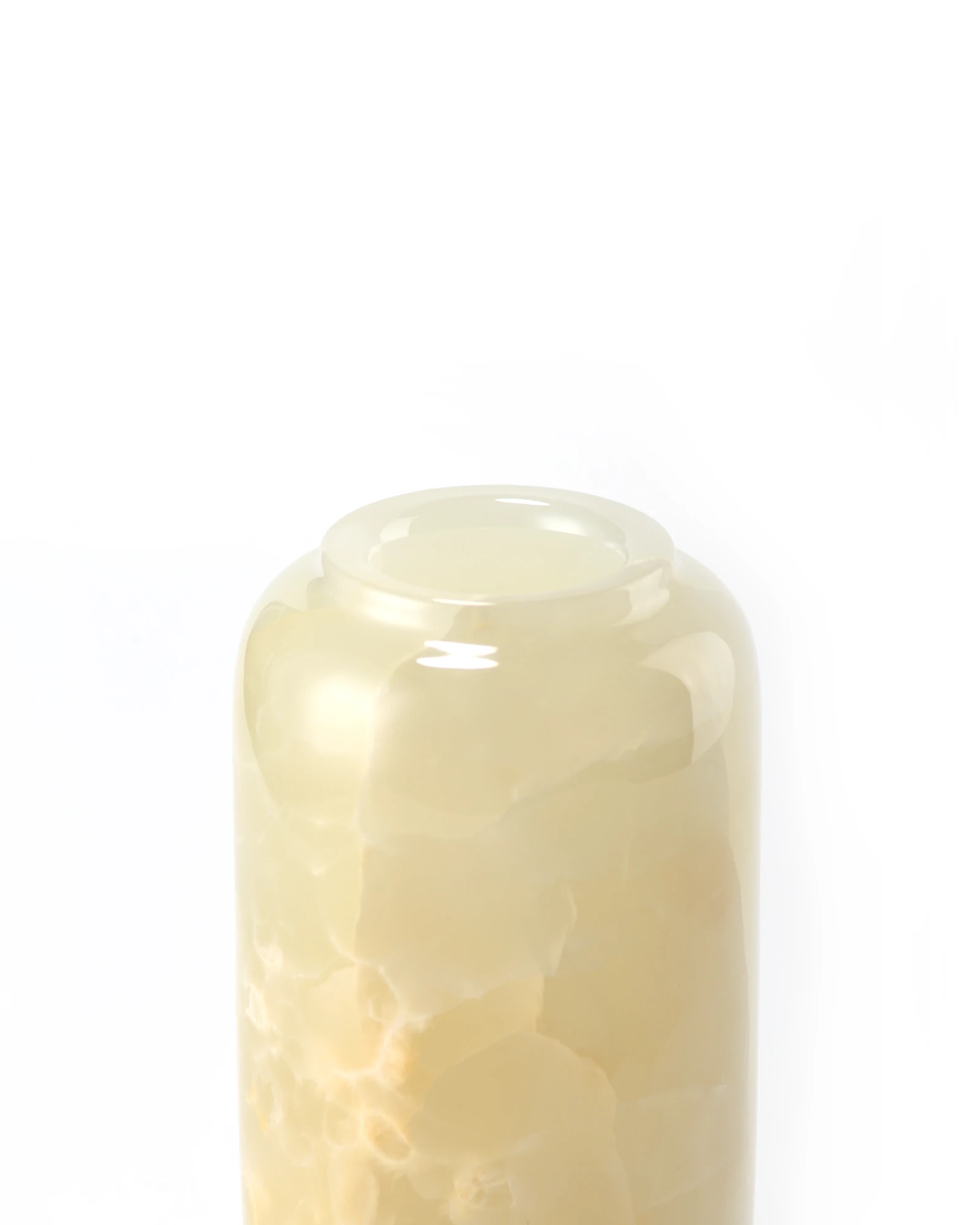 Close-up of smooth rim on green onyx vase