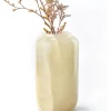 Front view of green onyx vase showing natural crackle texture with dried branches