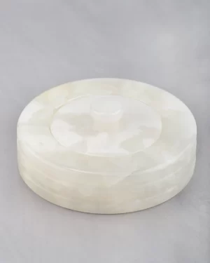45-degree view of white onyx canister jar with rounded shape