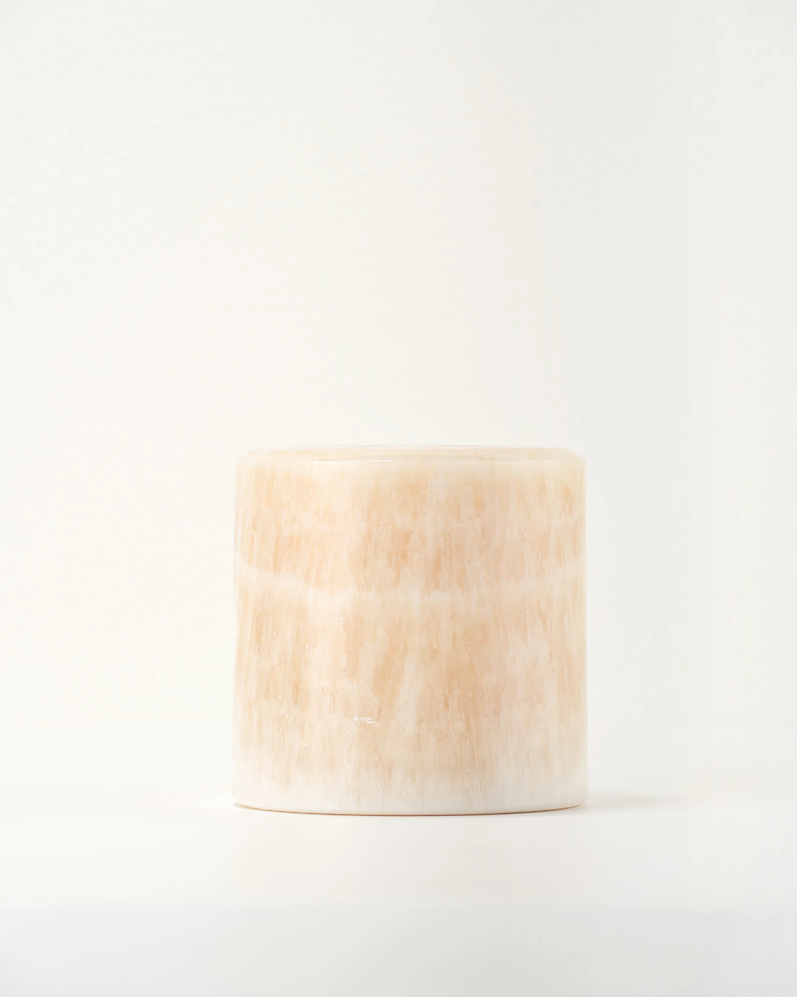Yellow onyx table lamp with crackled surface reflecting light