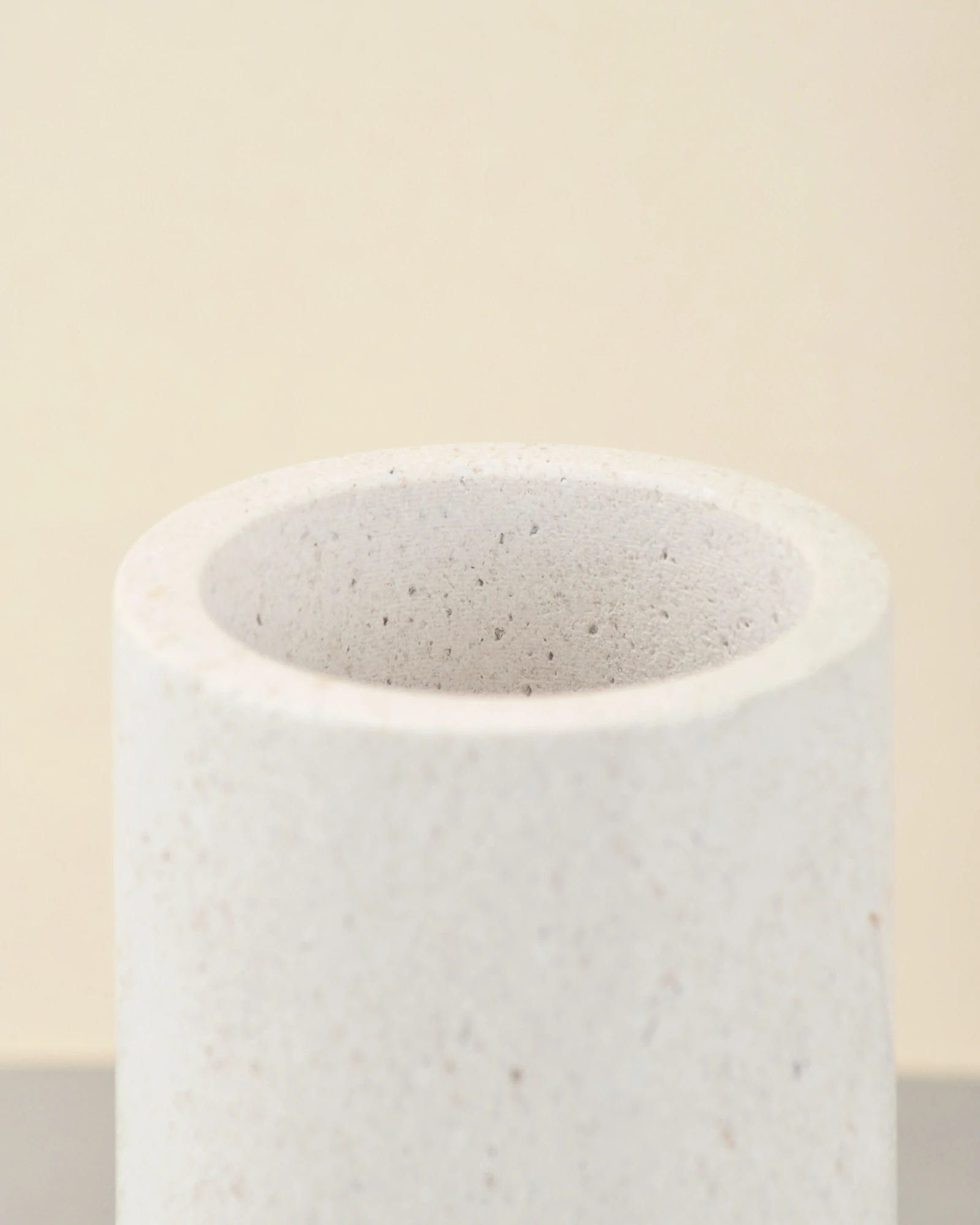 White Stone Candle Holder close-up of circular cut-out window