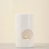 White Stone Candle Holder front view with candle lit
