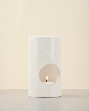 White Stone Candle Holder front view with candle lit