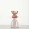 Front view of vintage red marble candle holder