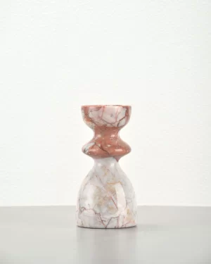 Front view of vintage red marble candle holder