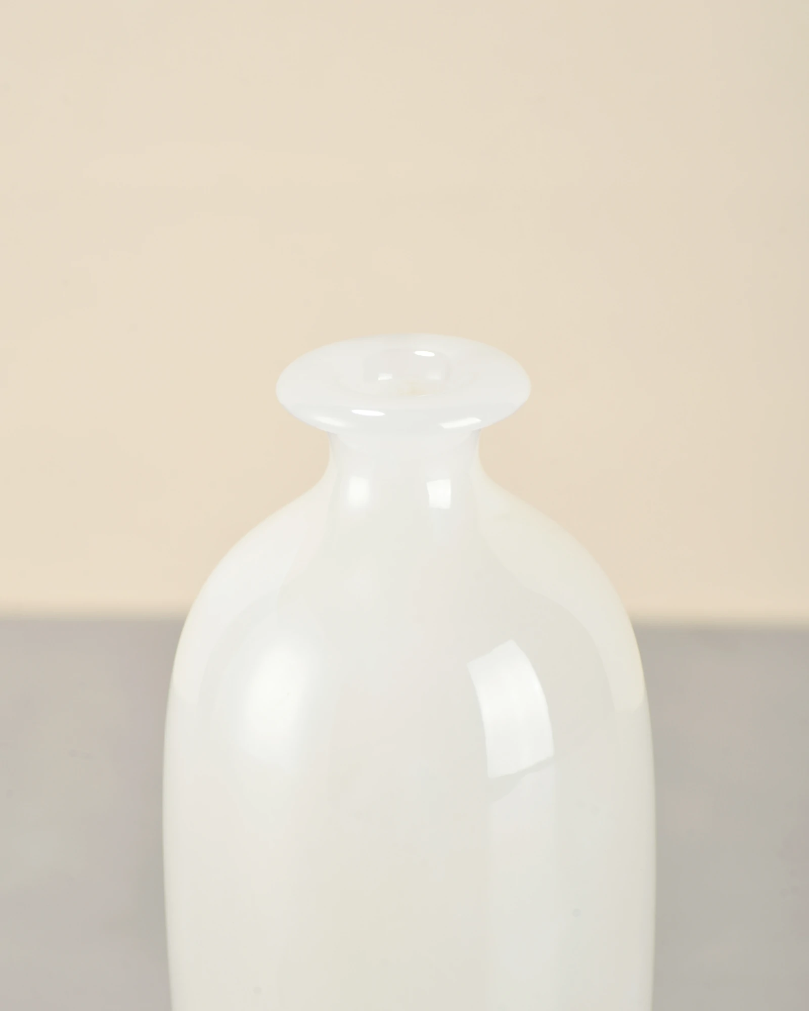 Mini White Onyx Vase 45-degree rim close-up showing polished edge and translucency