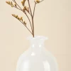Mini White Onyx Vase front close-up with flowers showing graceful curved rim