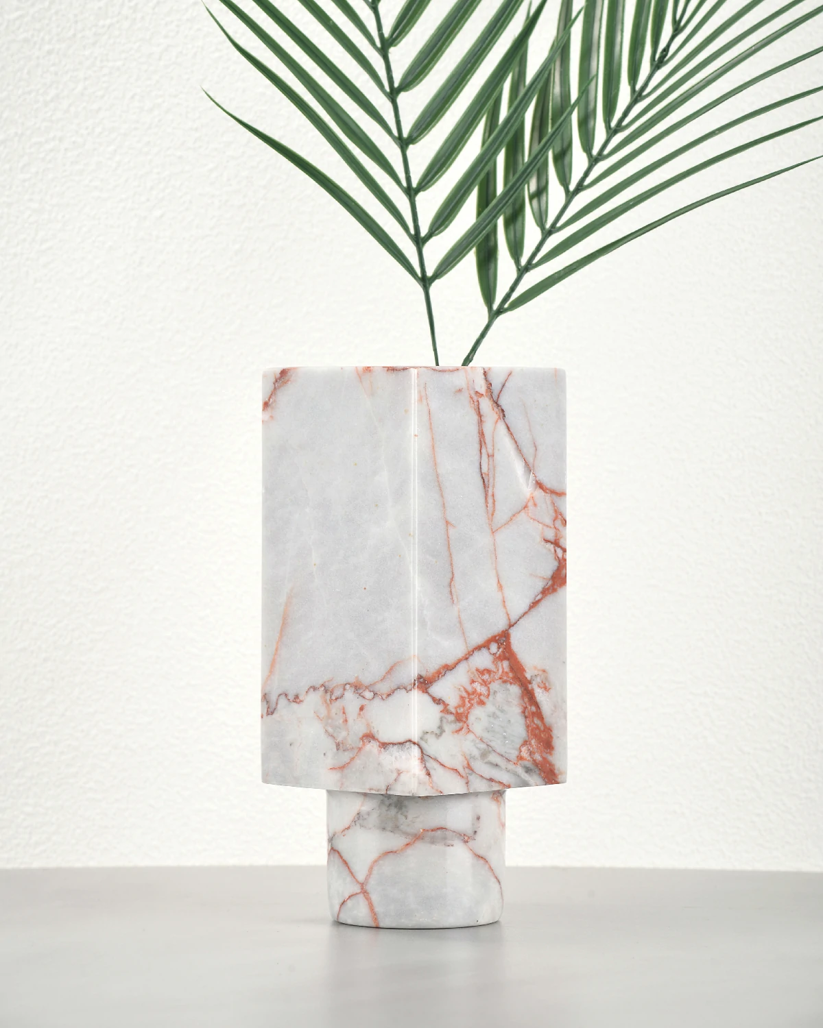 Vintage Red Marble Vase styled with floral arrangement