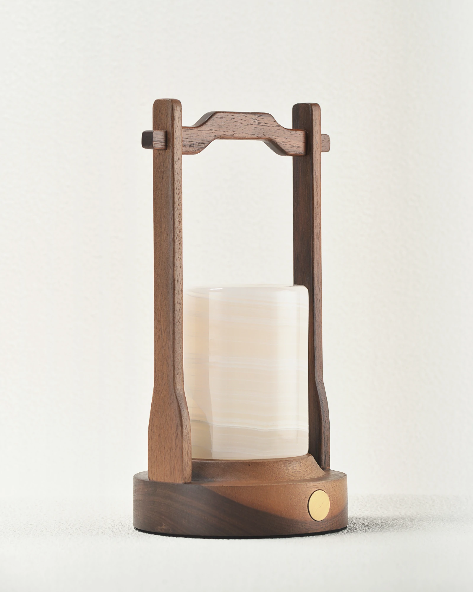 Side view of portable white onyx table lamp
