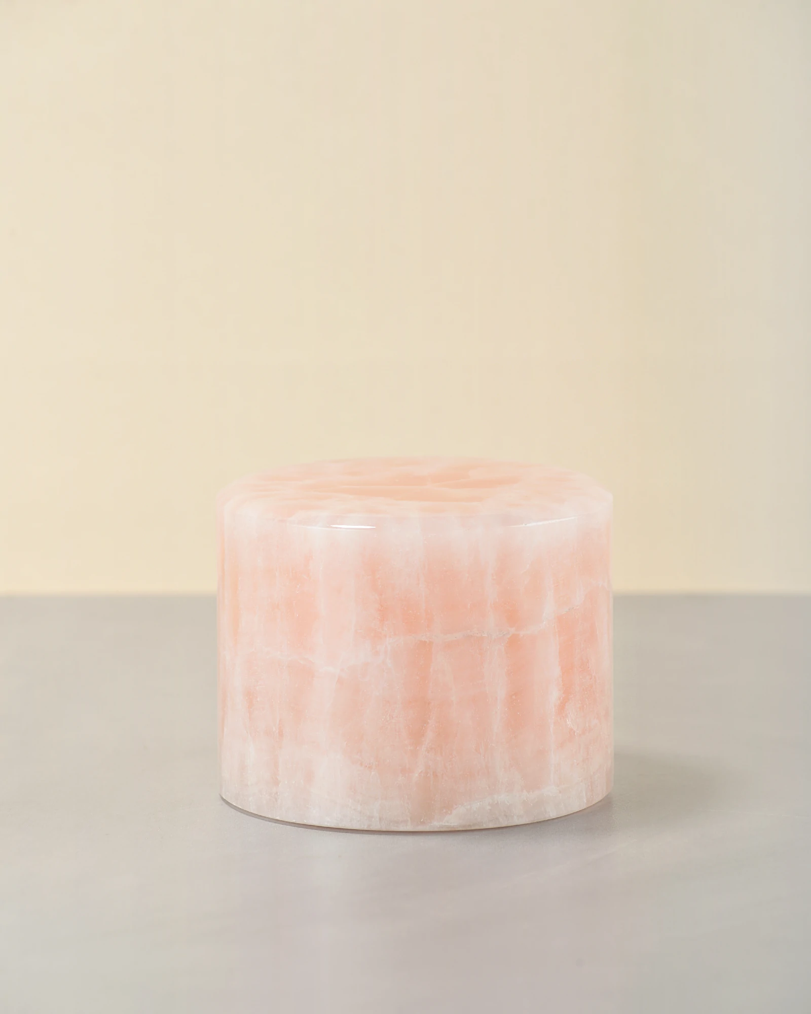 Mini pink and white onyx table lamp 45-degree view