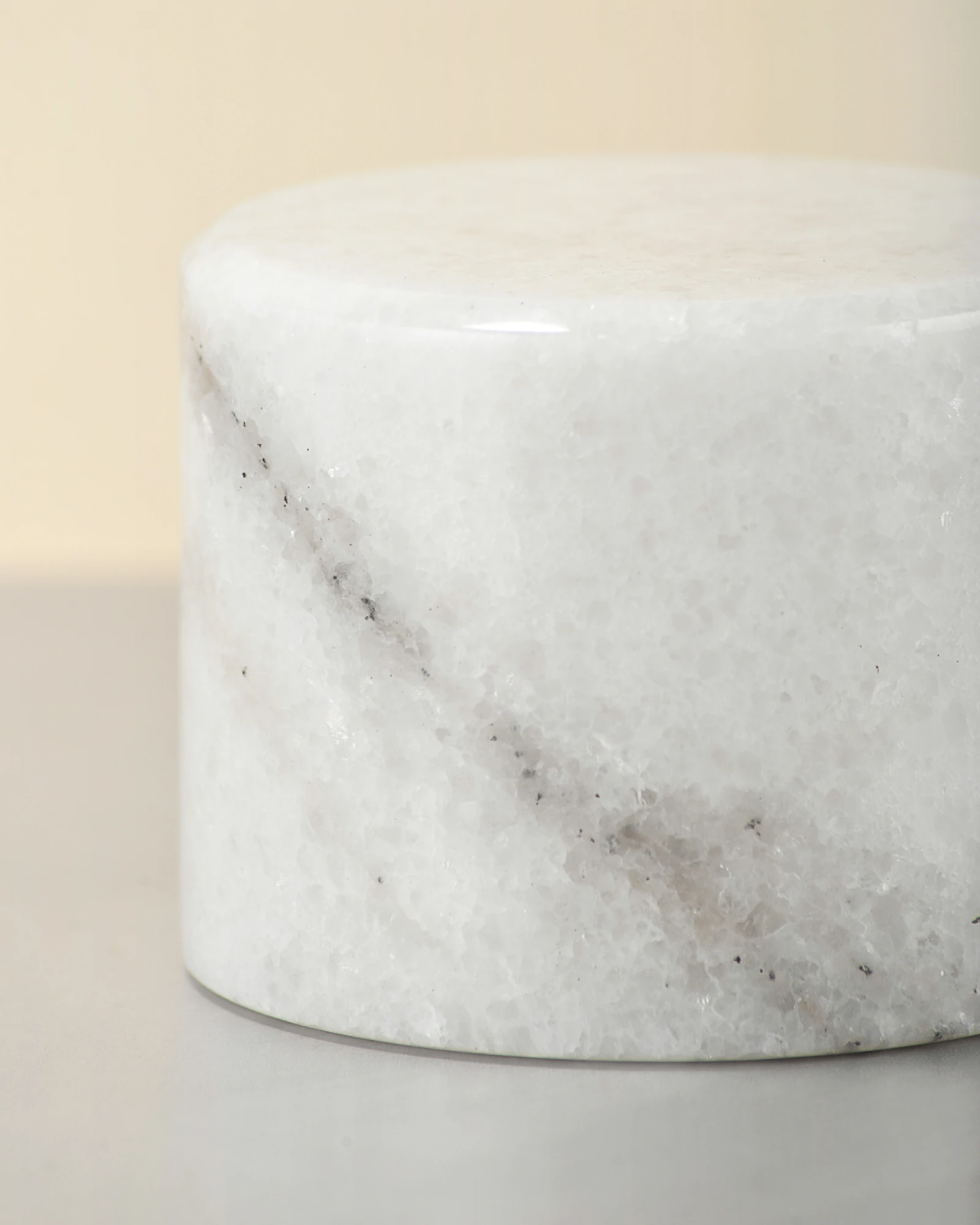 Mini white onyx table lamp close-up with natural gray veins