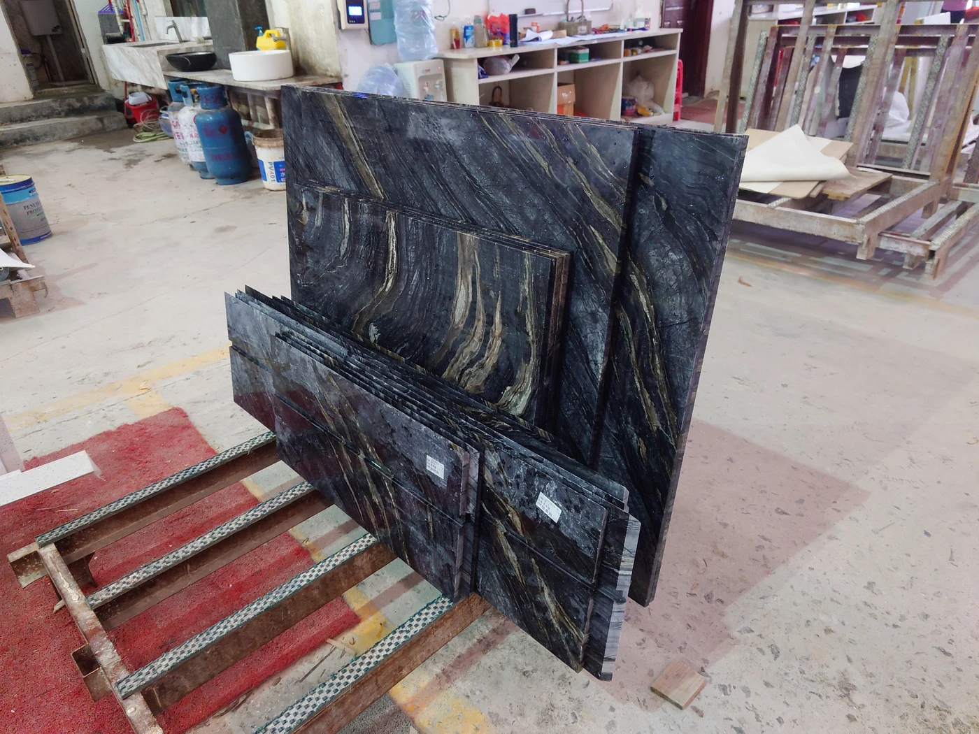 Water-ground Black Wooden Marble reception desk components prepared for shipment