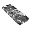 Three-quarter view of the Bvlgari Black marble tray, Piece A, showing the stone pattern and shallow rim.
